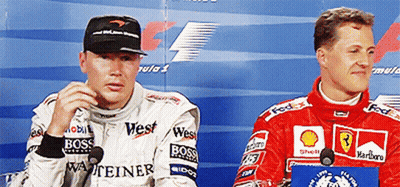 Two Men In West And Marlboro Vests GIF