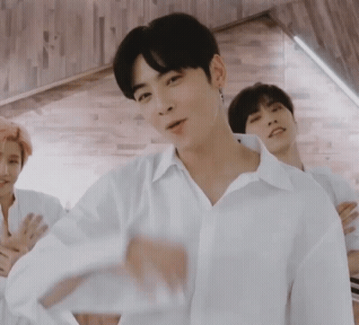Two Men In White Shirts Standing Together GIF