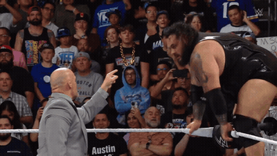 Two Men In Wrestling Ring One Wearing Austin T-Shirt GIF