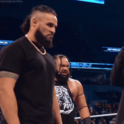 Two Men In Wrestling Ring One With NMX Shirt GIF