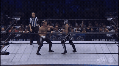 Two Men In Wrestling Ring With Available Now Sign GIF