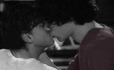 Two Men Kissing Black And White Photo GIF
