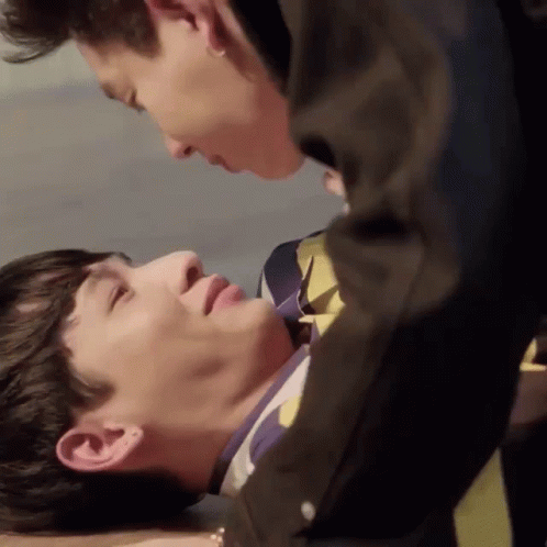 Two Men Kissing Close Up GIF