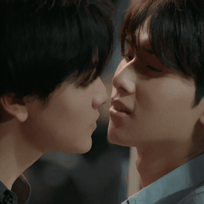 Two Men Kissing Close Up GIF