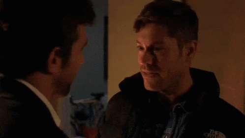 Two Men Kissing In Darkness GIF