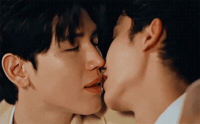 Two Men Kissing on the Cheek
