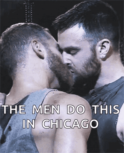 Two Men Kissing Saying The Men Do This In Chicago GIF