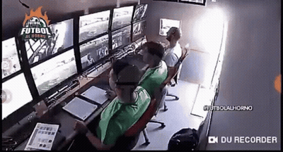 Two Men Kneeling In Red And Black Shirts EA Sports GIF