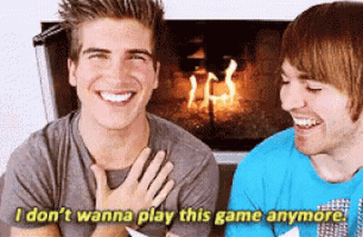 Two Men Laughing By Fireplace Says I Don't Wanna Play This Game Anymore GIF