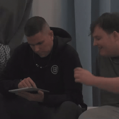 Two Men Laughing One Says Wat GIF