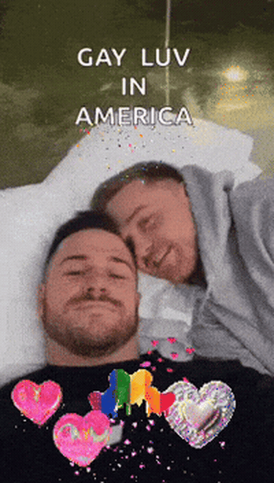 Two Men Laying On Bed Gay Luv In America GIF
