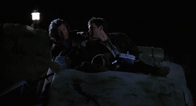 Two Men Laying On Couch I Bet That Burned His Skinny Ass GIF