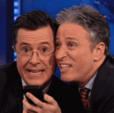 Two Men Looking At Cell Phone GIF