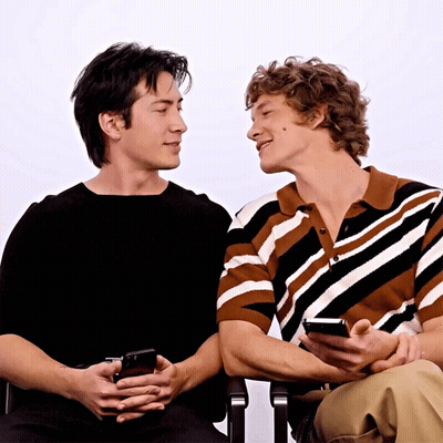Two Men Looking At Cell Phone GIF