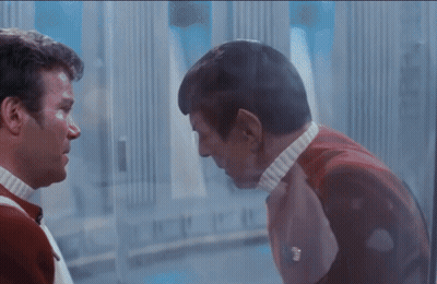 Two Men Looking At Each Other GIF