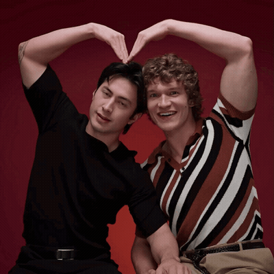 Two Men Looking At Each Other GIF