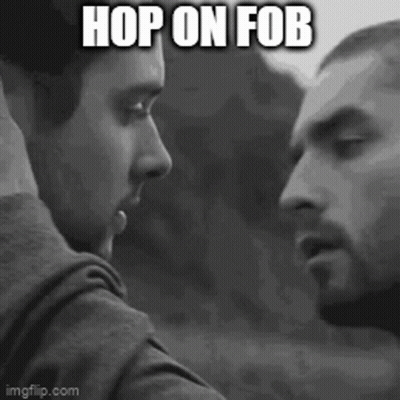 Two Men Looking At Each Other Hop On Fob GIF