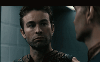 Two Men Looking At Each Other In Mirror GIF