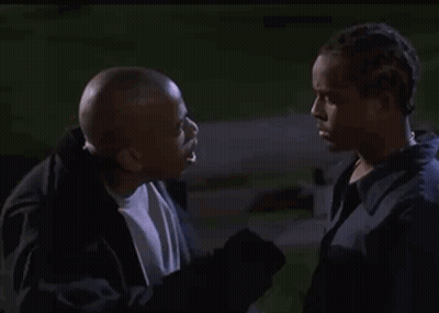 Two Men Looking At Each Other GIF