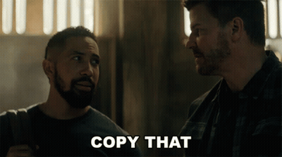 Two Men Looking At Each Other Saying Copy That GIF