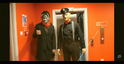 Two Men Near No Smoking Sign GIF