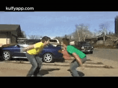 Two Men Next To Blue Car GIF