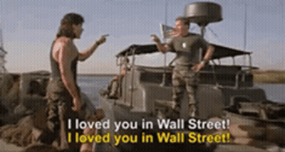 Two Men Next To Boat, One Pointing GIF