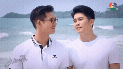 Two Men On Beach With Arctica Shirt GIF