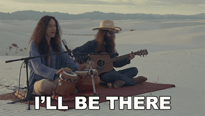 Two Men On Blanket In Desert Saying I'll Be There GIF