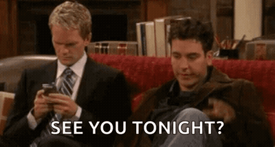 Two Men On Couch Looking At Phones Saying See You Tonight GIF