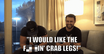 Two Men On Couch Saying I Would Like The F In Crab Legs GIF