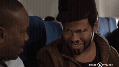 Two Men On Plane With Comedy Central Logo GIF