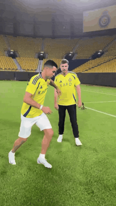 Two Men On Soccer Field One In Kafo Jersey GIF
