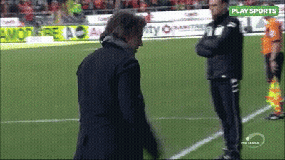 Two Men On Soccer Field Saying Play Sports GIF