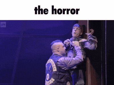 Two Men On Stage Saying The Horror GIF