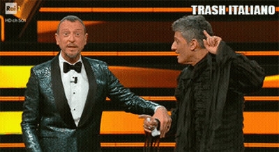 Two Men On Stage With Trash Italiano GIF