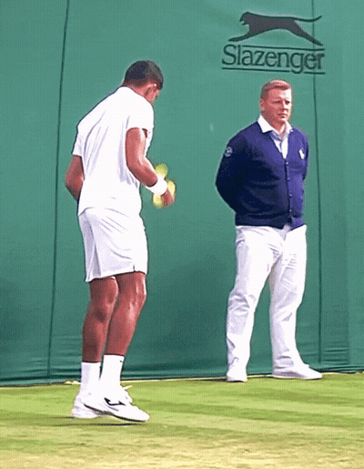 Two Men On Tennis Court In Front Of Slazenger Logo GIF