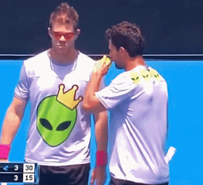 Two Men On Tennis Court One In Purple Alien Shirt GIF