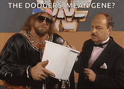Two Men One Holding Microphone One Holding Paper GIF