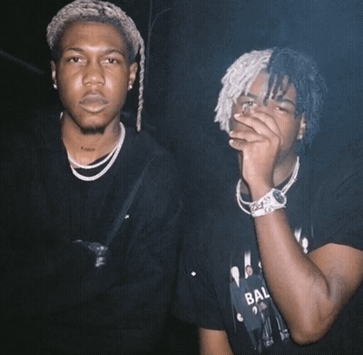 Two Men One In Bal Shirt GIF