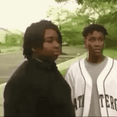 Two Men, One In Baseball Jersey GIF