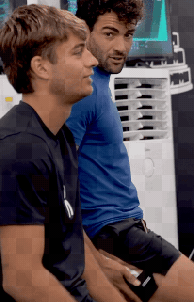 Two Men One In Black Puma Shirt GIF