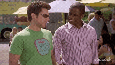 Two Men One In Green Apple Jacks Shirt GIF