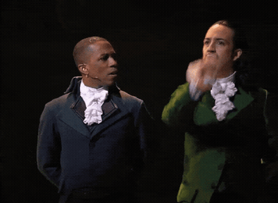 Two Men One In Green Suit GIF