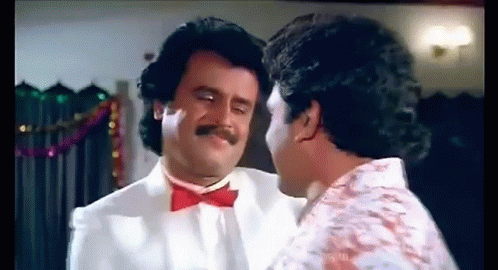 Two Men One In Red Bow Tie GIF