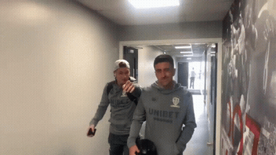Two Men One In Unibet Sweatshirt GIF