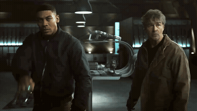 Two Men One Pointing At Camera GIF