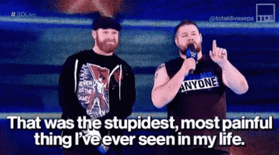 Two Men, One Wearing Anyone Shirt GIF