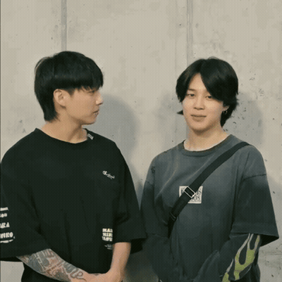 Two Men One Wearing Real World Shirt GIF