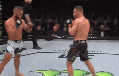Two Men One Wearing Smack Down Shirt GIF